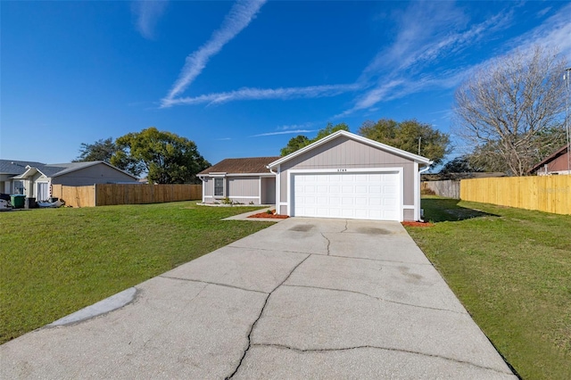 single story home featuring a garage, driveway, a front yard, and fence