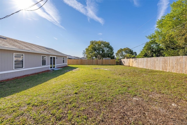 view of yard featuring a fenced backyard