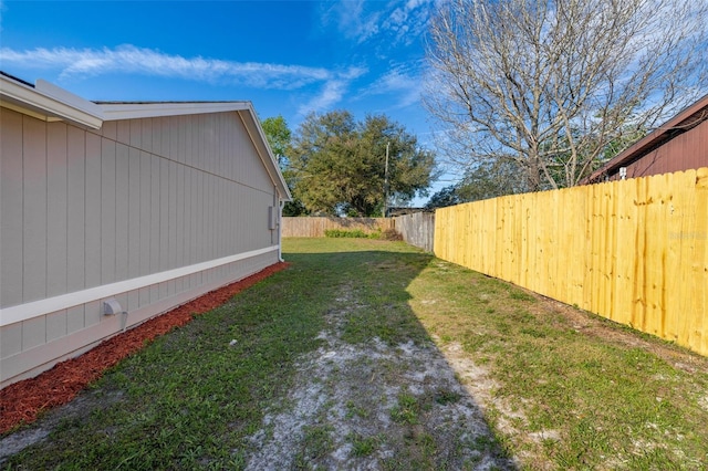 view of yard featuring fence