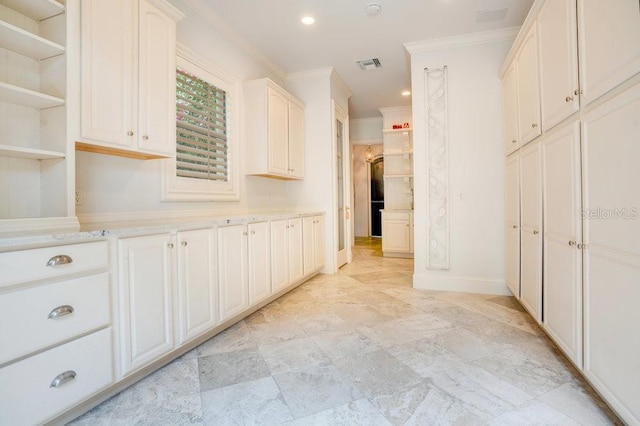 1400 Alabama Dr, Winter Park, FL 32789 - kitchen with visible vents, light countertops, ornamental molding, and open shelves