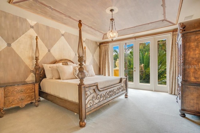 1400 Alabama Dr, Winter Park, FL 32789 - carpeted bedroom featuring a tray ceiling and access to outside