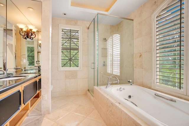 1400 Alabama Dr, Winter Park, FL 32789 - full bath featuring a whirlpool tub, vanity, a stall shower, toilet, and tile walls