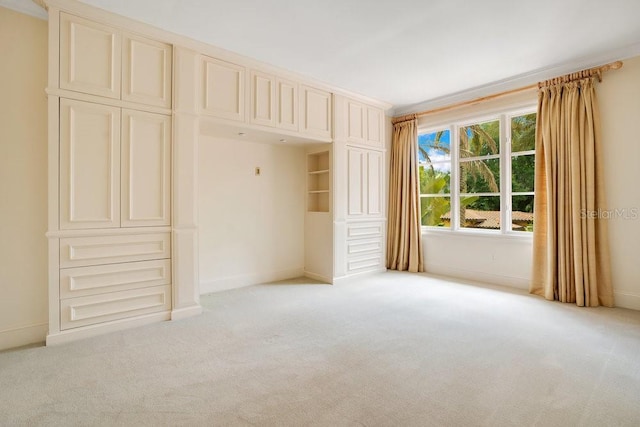 1400 Alabama Dr, Winter Park, FL 32789 - unfurnished bedroom featuring light carpet and baseboards
