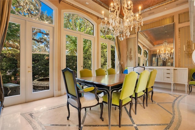 1400 Alabama Dr, Winter Park, FL 32789 - dining area featuring ornamental molding, a high ceiling, a raised ceiling, french doors, and a notable chandelier