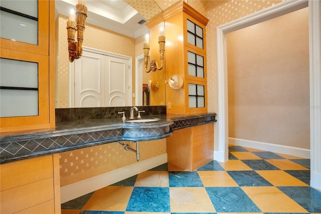 1400 Alabama Dr, Winter Park, FL 32789 - bathroom featuring vanity, baseboards, ornamental molding, tile patterned floors, and visible vents