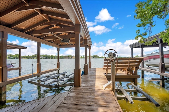 1400 Alabama Dr, Winter Park, FL 32789 - dock area featuring a water view and boat lift