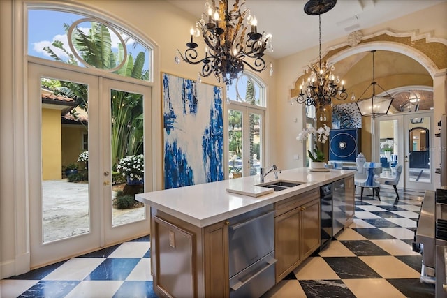 1400 Alabama Dr, Winter Park, FL 32789 - kitchen featuring a sink, a warming drawer, a notable chandelier, and light floors
