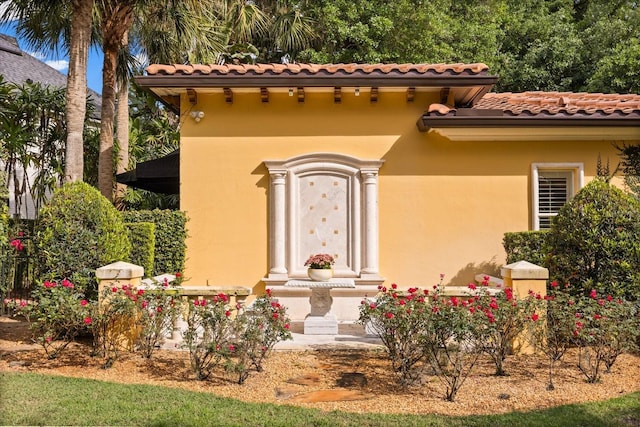 1400 Alabama Dr, Winter Park, FL 32789 - view of front of home with stucco siding and a tile roof