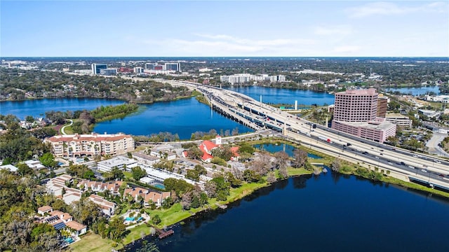 aerial view featuring a view of city and a water view