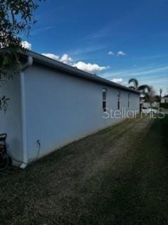 view of home's exterior with stucco siding