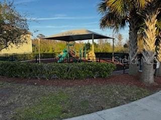 view of play area with fence