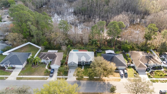 birds eye view of property with a residential view