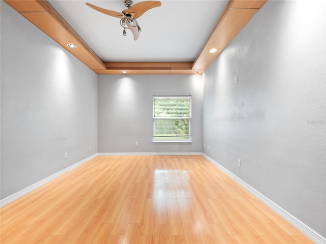 unfurnished room with a ceiling fan, recessed lighting, baseboards, and light wood finished floors