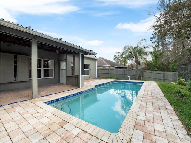 view of swimming pool with a patio area, a fenced backyard, and a fenced in pool