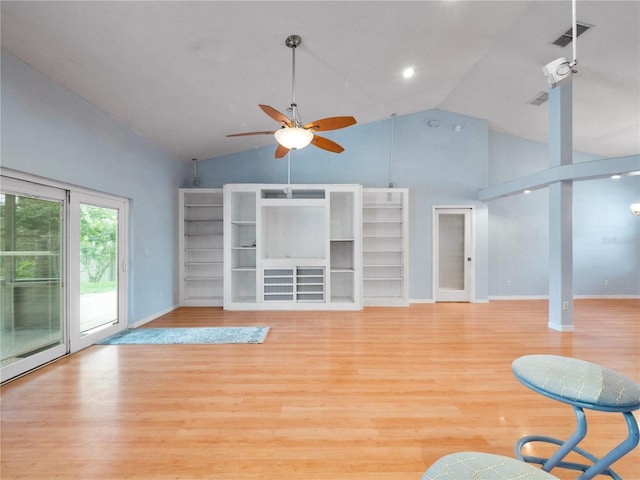 unfurnished living room with baseboards, wood finished floors, visible vents, and a ceiling fan