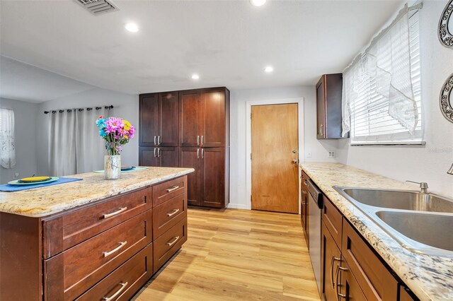 kitchen with recessed lighting, a sink, visible vents, dishwasher, and light wood finished floors