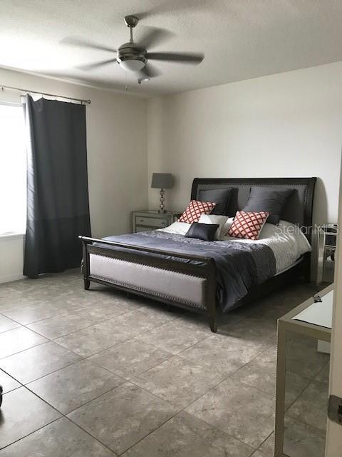 bedroom featuring a ceiling fan