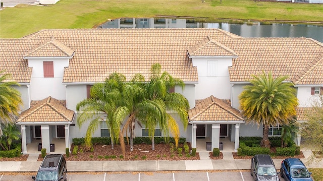 exterior space with a water view