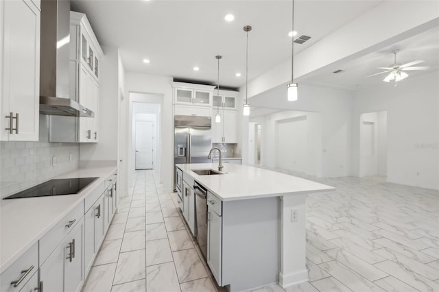 kitchen featuring marble finish floor, black electric stovetop, recessed lighting, wall chimney range hood, and dishwasher