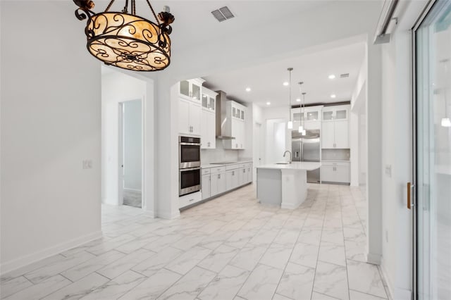 kitchen with visible vents, marble finish floor, stainless steel appliances, light countertops, and recessed lighting