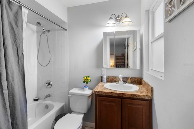 bathroom with vanity, toilet, and shower / tub combo with curtain