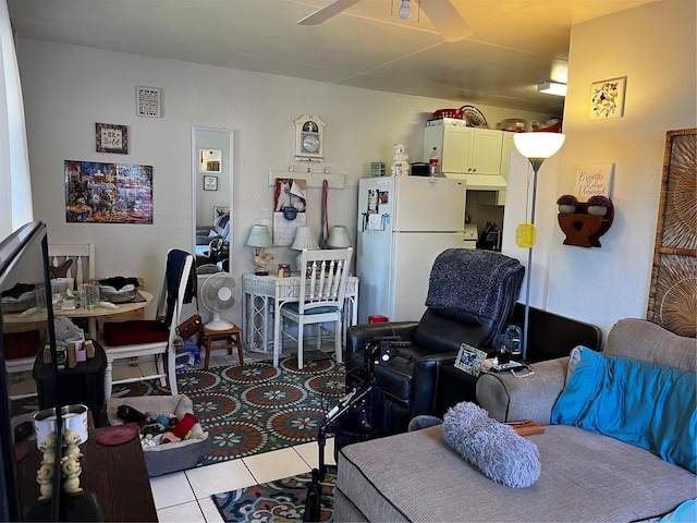 living room with ceiling fan, light tile patterned flooring, and visible vents