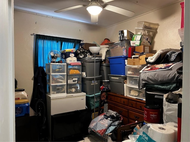 storage area featuring ceiling fan