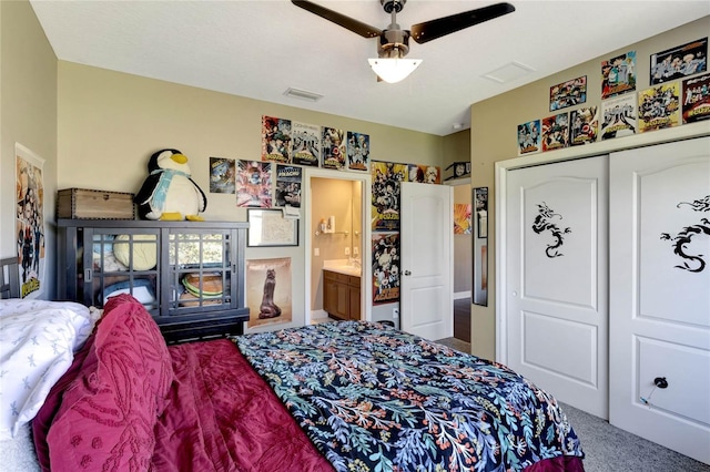 bedroom featuring ceiling fan, a closet, carpet, and visible vents