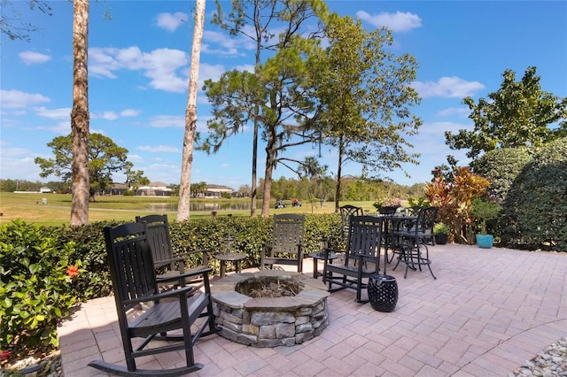 view of patio / terrace with a fire pit