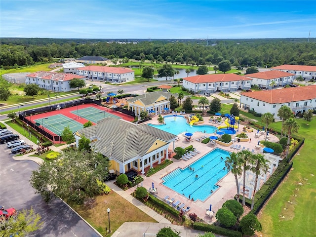 drone / aerial view with a view of trees