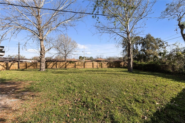 view of yard with fence