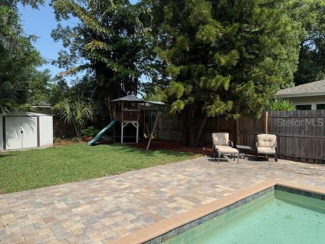1721 Cheyenne Trl, Maitland, FL 32751 - view of pool with a patio area and a playground