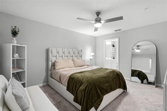 bedroom with carpet floors, baseboards, visible vents, and a ceiling fan