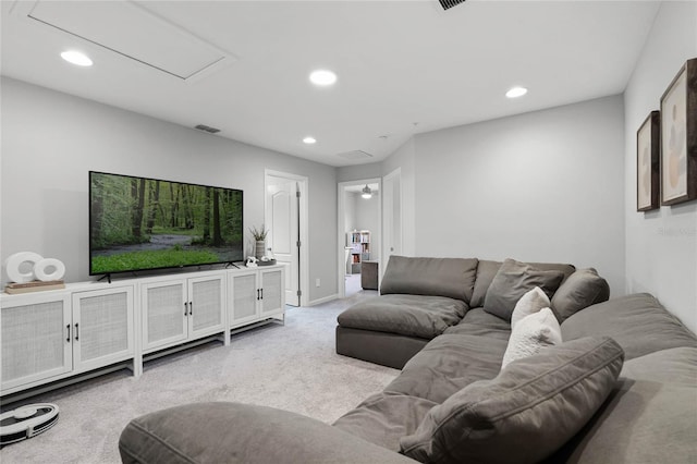 living room featuring carpet floors, recessed lighting, visible vents, and baseboards