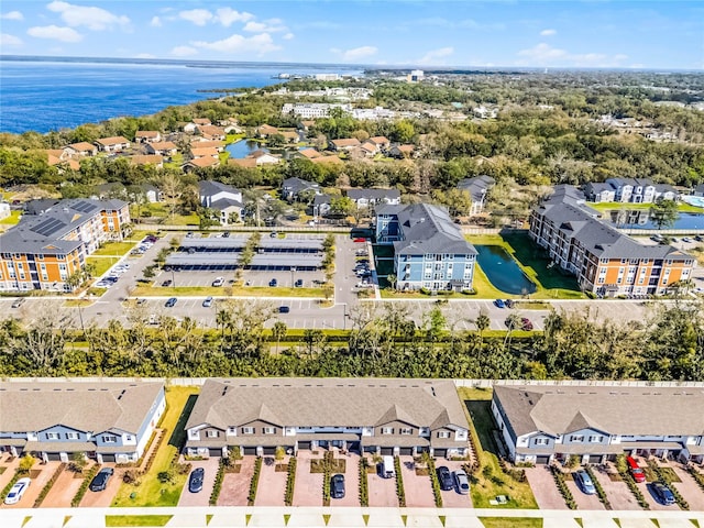 aerial view with a residential view and a water view