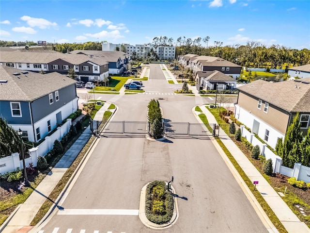 birds eye view of property with a residential view