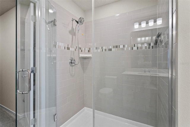 full bathroom with a stall shower