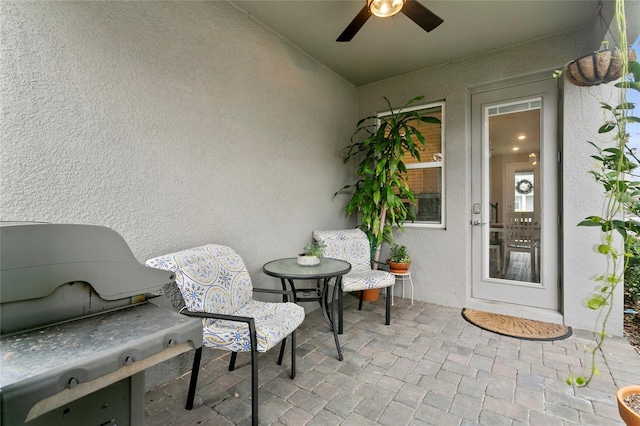 view of patio / terrace with a ceiling fan