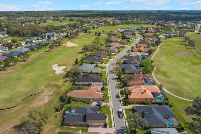 birds eye view of property featuring a water view, a residential view, and golf course view