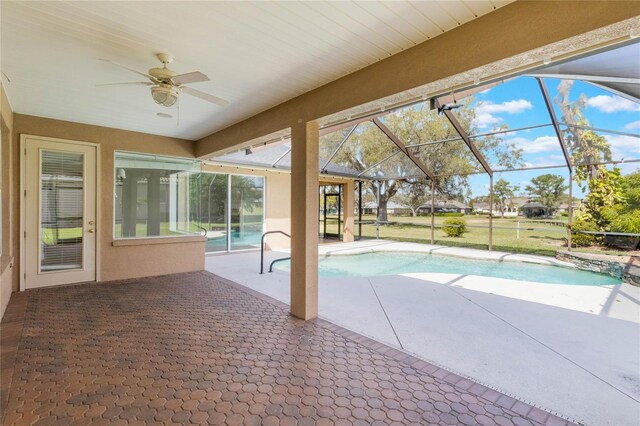 674 Whisper Woods Dr, Lakeland, FL 33813 - outdoor pool with a lanai, a patio area, and ceiling fan