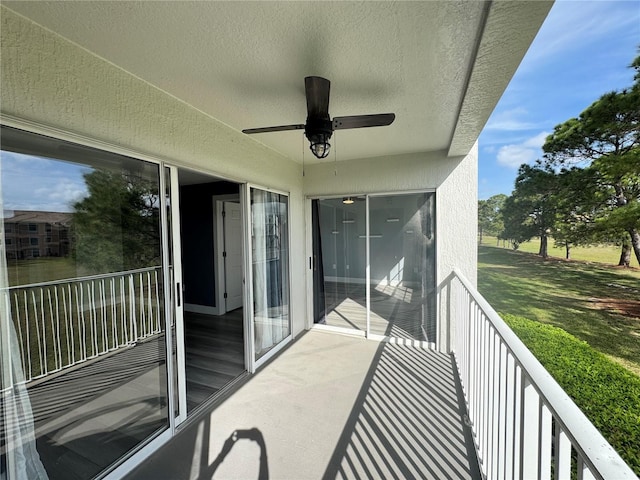 balcony featuring a ceiling fan