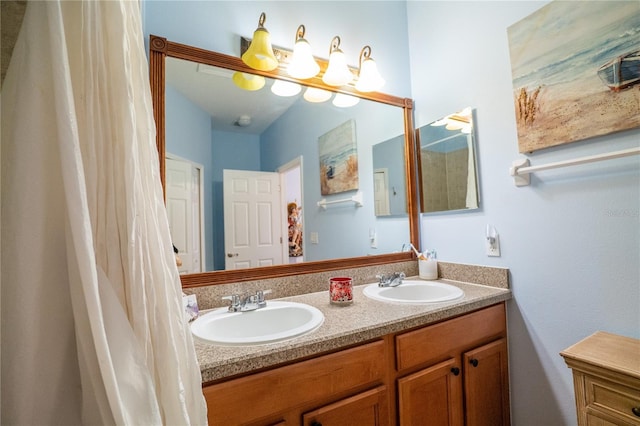 full bath with a sink and double vanity