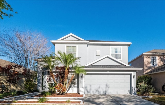 14415 Estrella Dr, Orlando, FL 32837 - traditional-style home featuring stucco siding, driveway, and an attached garage