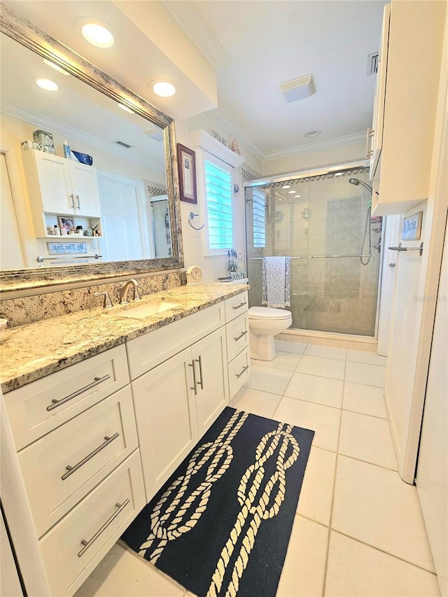 1706 S Lakeside Ct, Venice, FL 34293 - bathroom with crown molding, toilet, tile patterned floors, vanity, and a stall shower