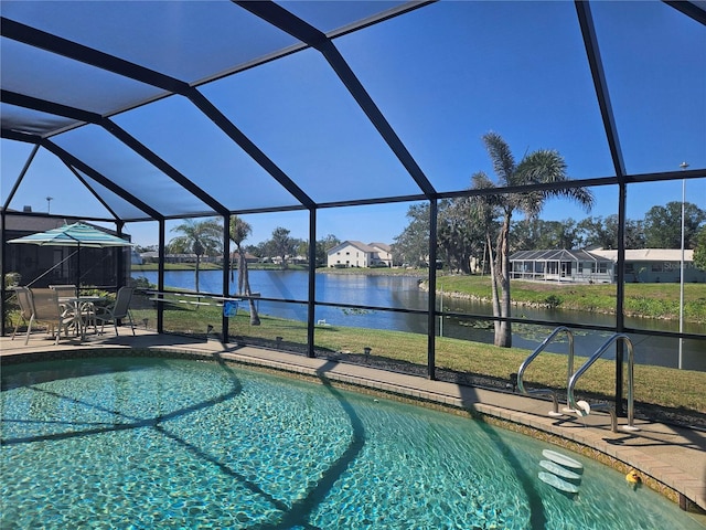 1706 S Lakeside Ct, Venice, FL 34293 - pool with a water view, a lanai, and a patio