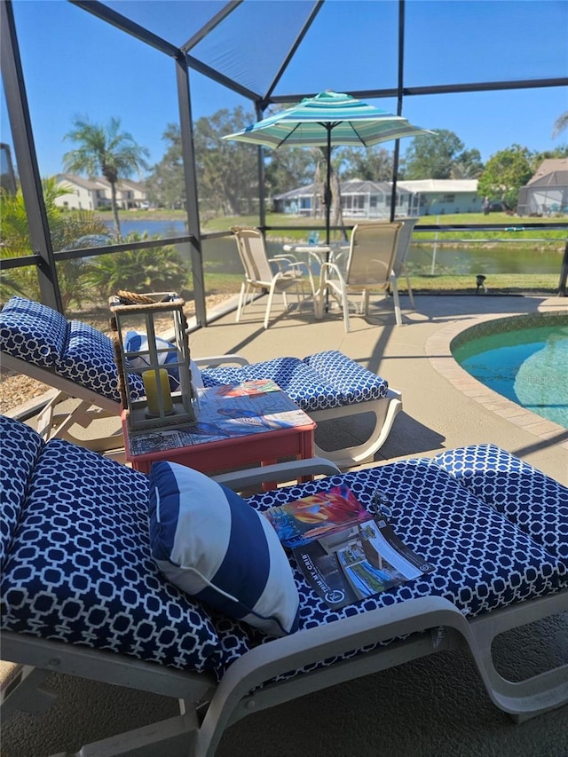 1706 S Lakeside Ct, Venice, FL 34293 - sunroom featuring a water view and outdoor dining area