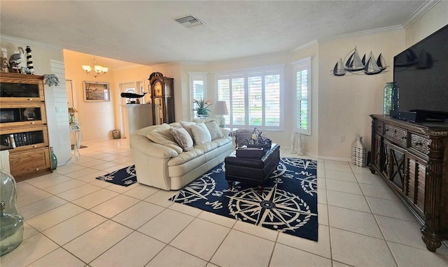 1706 S Lakeside Ct, Venice, FL 34293 - living area featuring ornamental molding, tile patterned floors, and an inviting chandelier