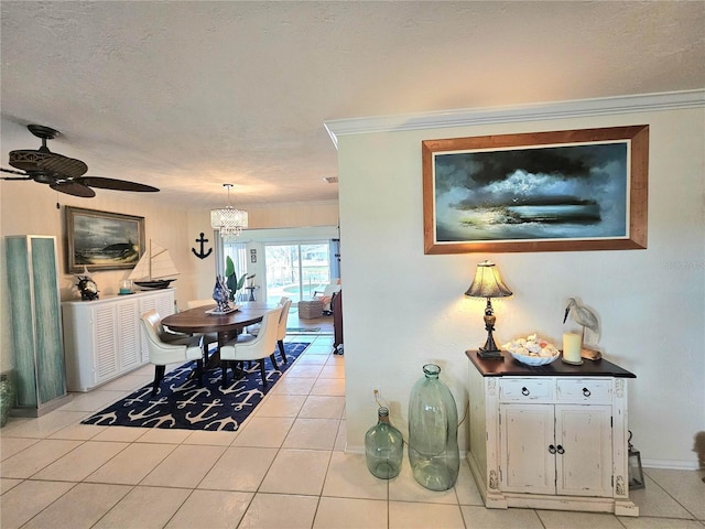 1706 S Lakeside Ct, Venice, FL 34293 - dining space featuring light tile patterned flooring, a textured ceiling, and crown molding