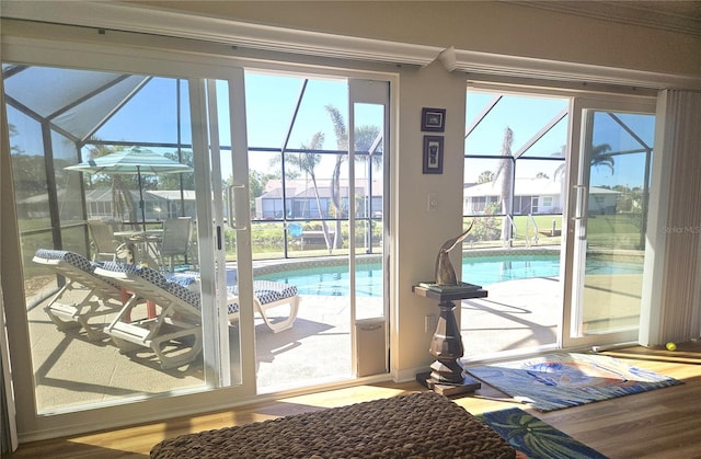 1706 S Lakeside Ct, Venice, FL 34293 - entryway featuring a sunroom and wood finished floors