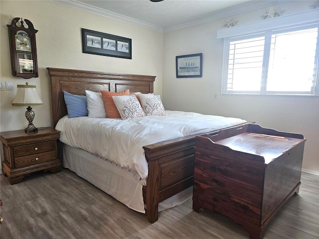 1706 S Lakeside Ct, Venice, FL 34293 - bedroom featuring wood finished floors and crown molding